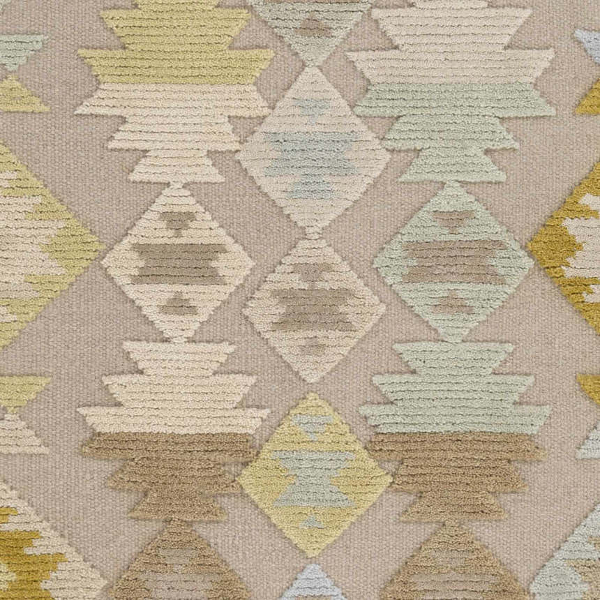 Close up of Rippon Area Carpet showing the beige, blue, and tan geometric, hand woven design. Swatch
