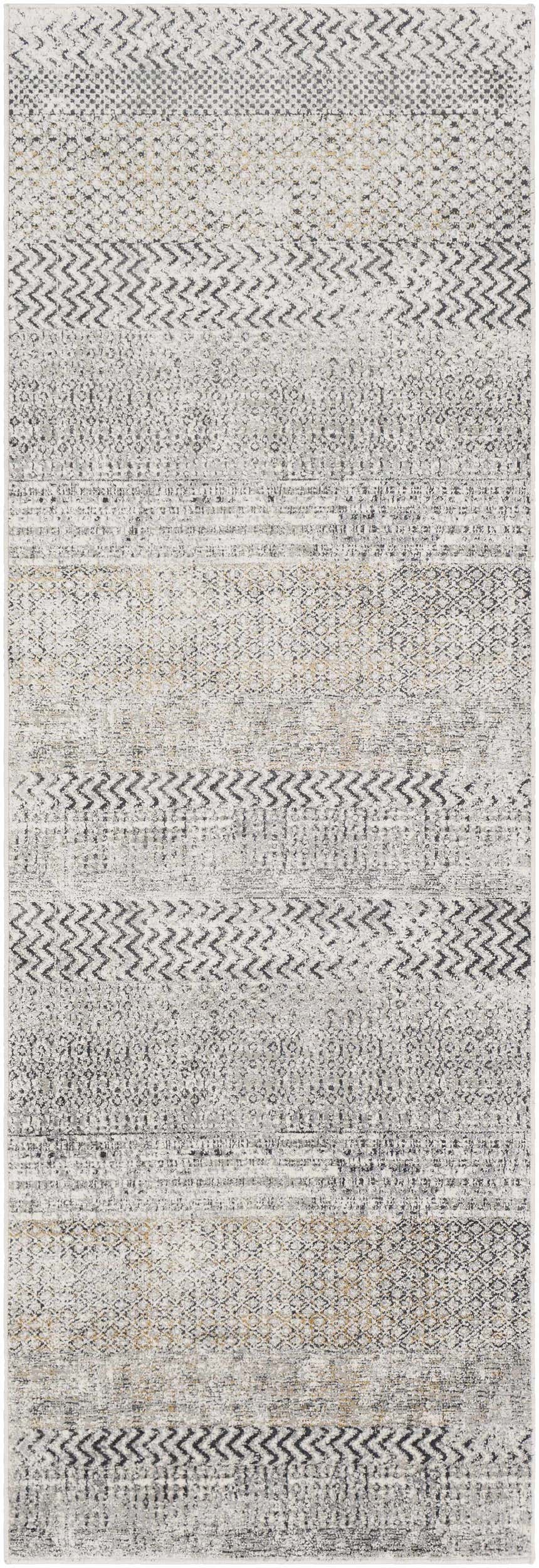 Close-up of the Rombauer Area Rug. Charcoal, gray, and off-white rug with contemporary geometric and striped patterns. Design-Runner-2777