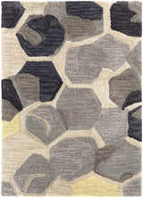 Close-up of the Romoland Area Rug. Hand-tufted polyester rug with a contemporary geometric pattern in black, gray, beige, and yellow. Design-Rectangle-23