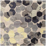 Close-up of the Romoland Area Rug, featuring a contemporary geometric pattern in black, brown, gray, and yellow hues. Design-Square-8