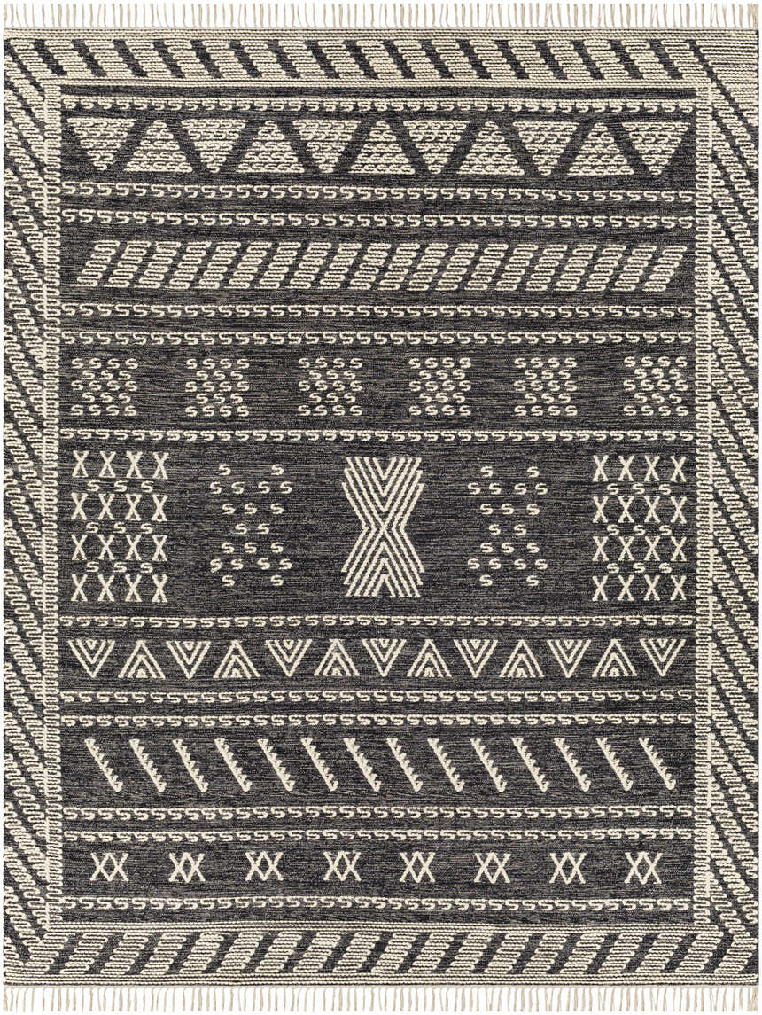 Close-up of the hand woven Rossville Area Rug. Features a geometric, tribal-inspired pattern in black and ivory. Design-Rectangle-810
