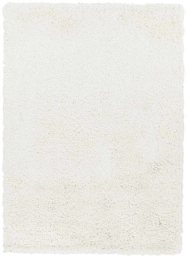 Close-up of the ivory Rowdy Carpet showing its hand woven shag texture. Design-Rectangle-57