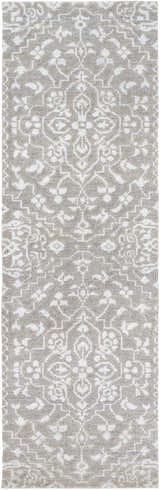 Close-up of the Roxobel Clearance Rug. Farmhouse style rug in light and medium gray with a traditional, hand-knotted pattern. Design-Runner-268