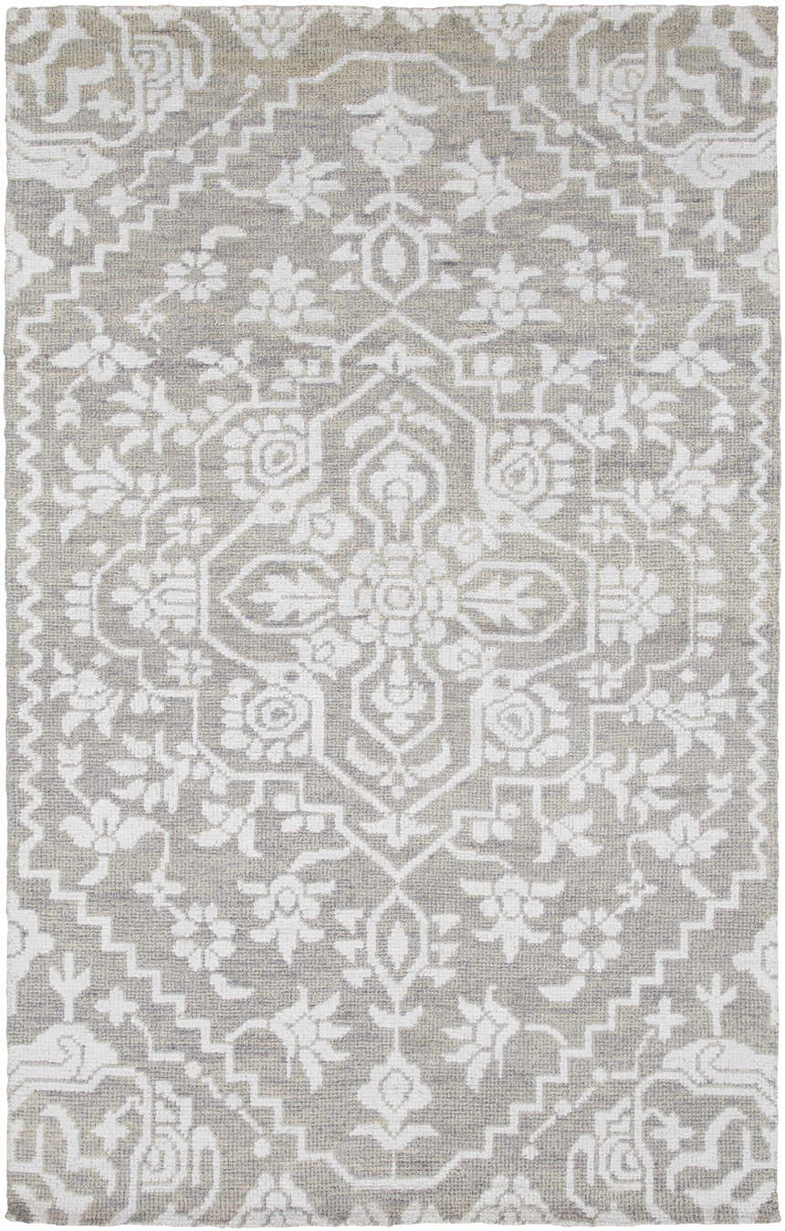 Close-up of Roxobel Clearance Rug. Light gray rug with traditional white floral and geometric pattern. Hand-knotted texture. Design-Rectangle-576