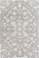 Close-up of Roxobel Clearance Rug. Light gray rug with a traditional white floral and geometric pattern. Hand-knotted texture. Design-Rectangle-69