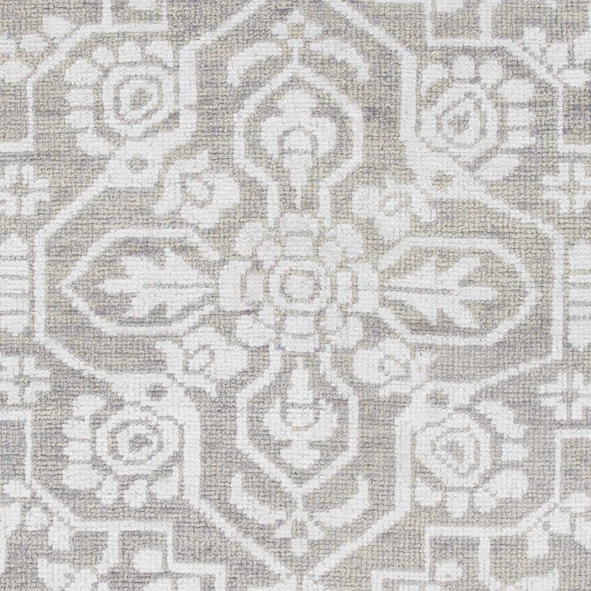 Close-up of Roxobel Clearance Rug showing light gray and medium gray traditional floral pattern and hand-knotted texture. Swatch