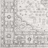 Close-up of the Rueter Area Rug, showcasing its charcoal, light gray, and white traditional pattern. Swatch