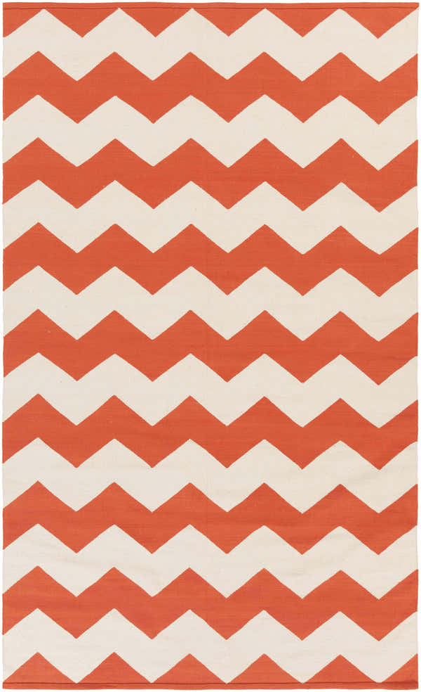 Close-up of the Runnemede Area Rug. Hand woven cotton rug with a coral and cream chevron pattern. Contemporary style. Design-Rectangle-58