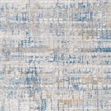 Close-up of the Runa Area Rug featuring a contemporary abstract pattern in blue, brown, gray, and off-white. Swatch