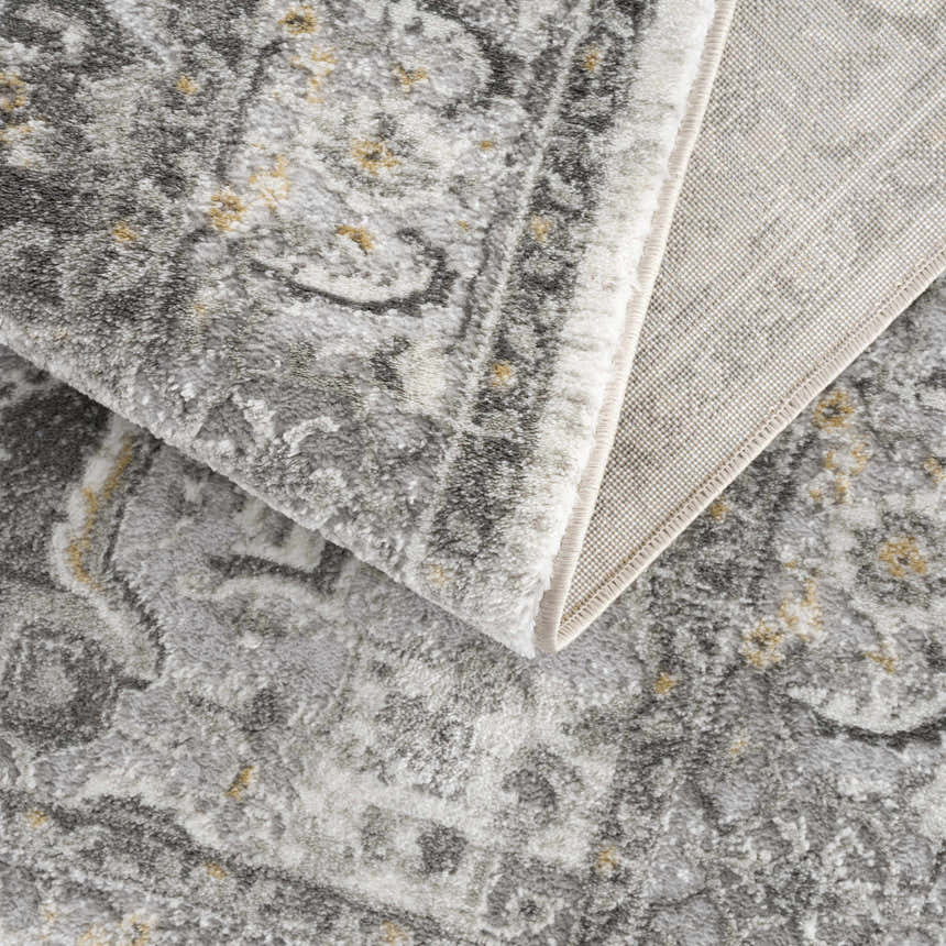 Close-up of the Liverpool Light Gray Area Rug showing its traditional pattern, gray tones, mustard accents, and woven texture. Fold