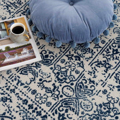 Michie Blue Area Rug - Clearance