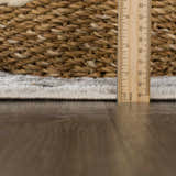 Close-up of the Liverpool Light Gray Area Rug showing the rug's pile height and texture with a ruler for scale. Pile