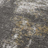 Close-up of the Liveree Abstract Area Rug, featuring light gray, medium gray, off white, and rust colors. Texture
