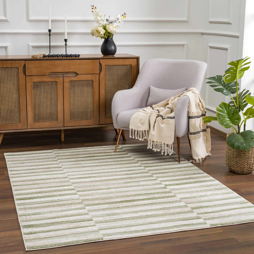 Living room scene with ivory walls, wood cabinet, and Liverpool Broken-Striped Area Rug in ivory and olive. Roomscene-Rectangle