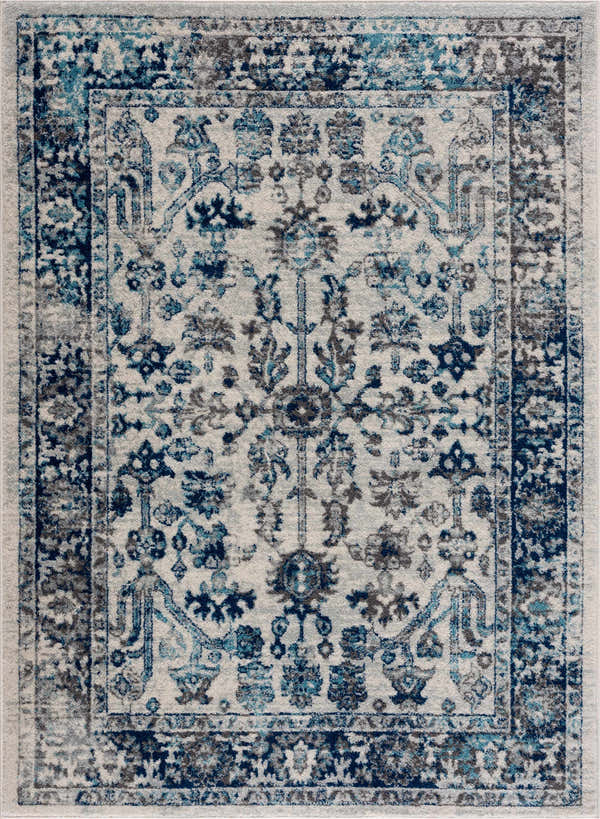 Close-up of the Istanbul Vintage Blue Area Rug, showcasing its ivory base and navy, gray, and blue traditional, oriental pattern. Design-Rectangle