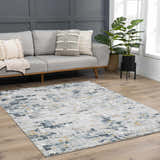 Living room scene with gray sofa and Liveri Abstract Blue Area Rug on wood floor. Roomscene-Rectangle