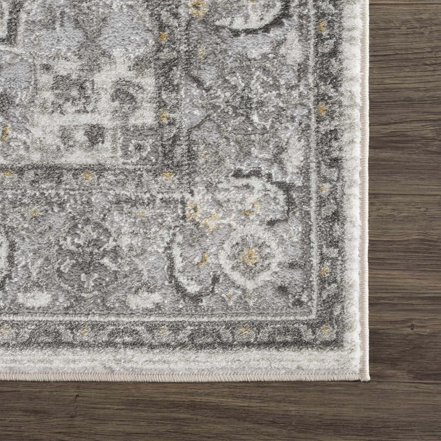 Close-up of the Liverpool Light Gray Area Rug showing its traditional charcoal, gray, and mustard pattern and soft texture. Swatch