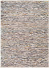 Close-up of the Apria Area Rug, a machine-woven rug with a contemporary design in beige, brown, and gray tones. Design-Rectangle-579