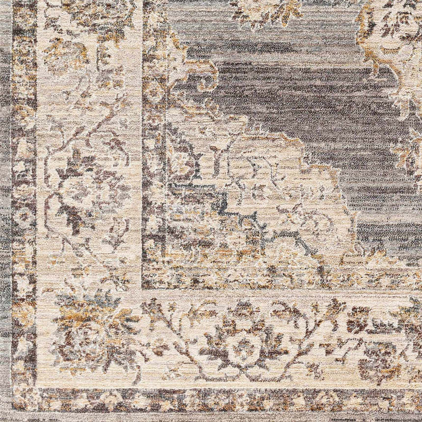 Close-up of the Crea Gray Zola Area Rug, showcasing its traditional floral pattern and soft charcoal, gray, and ivory hues. Swatch