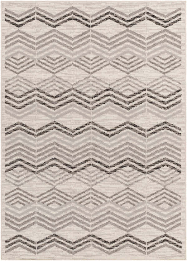 Close-up of the Saar Area Rug featuring a geometric chevron pattern in dark gray, gray, multi brown, and natural gray. Design-Rectangle-57