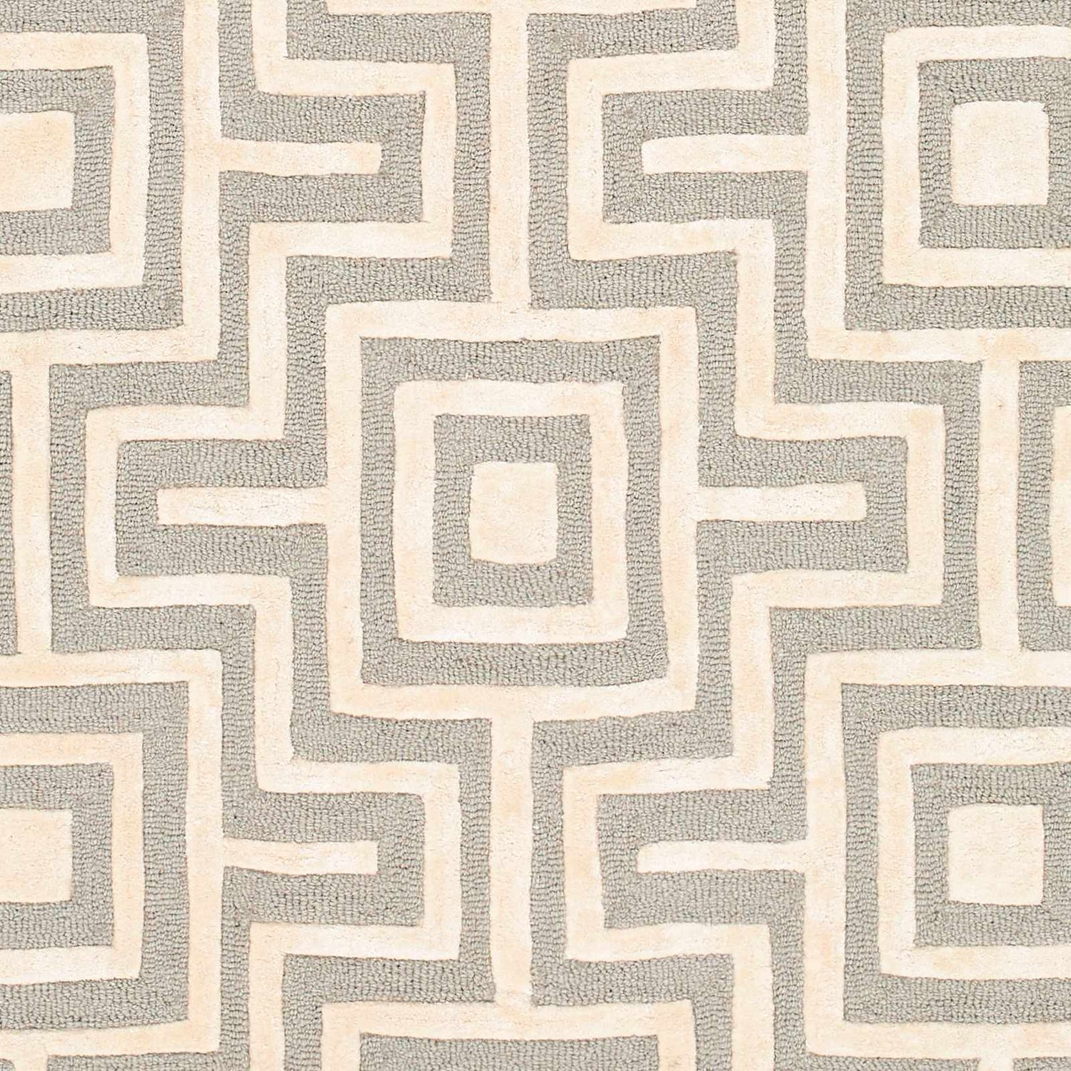 Close-up of the Fynn Beige Area Rug featuring a geometric maze pattern in beige and gray wool and viscose. Swatch