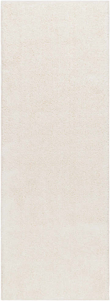 Close-up of the Judy White Washable Area Rug, showing its plush shag texture and off-white color. Design-Runner-2773