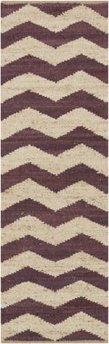 Close-up of the Saginaw Jute Carpet in beige and dark purple. Hand-woven rug with a bold chevron pattern. Design-Runner-38