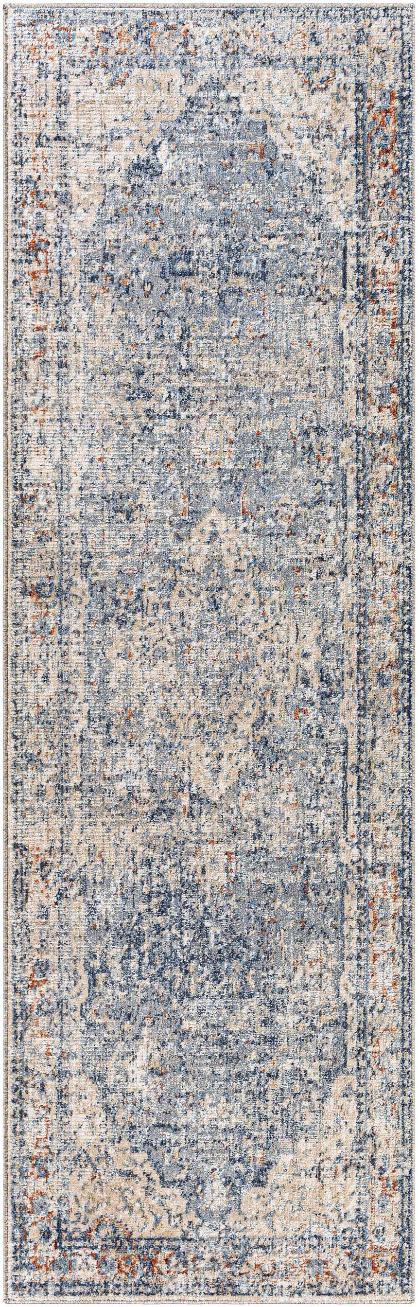 Close-up of the Salmo Area Rug, a clearance item, featuring a traditional pattern in denim, cream, and brick red hues. Design-Runner-268