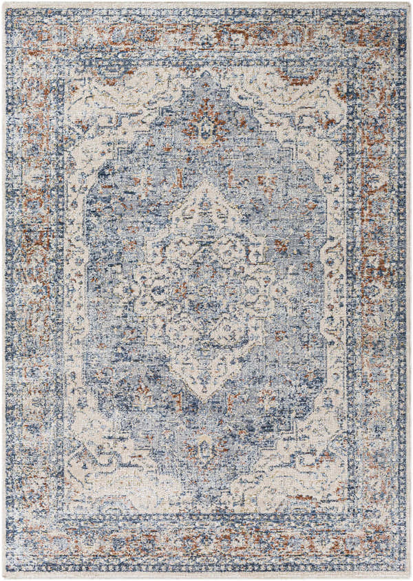 Close-up of the Salmo Area Rug. Traditional design in denim, cream, brick red, and gray. Machine-woven polyester rug. Design-Rectangle-579