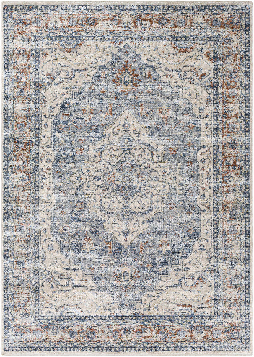 Close-up of the Salmo Area Rug. Traditional design in denim, cream, brick red, and gray. Machine-woven polyester rug. Design-Rectangle-579