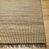 Close-up of the hand-woven Mihal Jute Rug. Camel and taupe jute rug with a linear pattern and fringed edge. Front