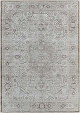 Detailed view of the Anzu Washable Rug in light gray and taupe. Traditional farmhouse style with an intricate, distressed pattern. Design-Rectangle-5373
