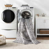 Athor Washable Rug being washed in a laundry room. Dark gray, brown traditional style. Washing-Machine