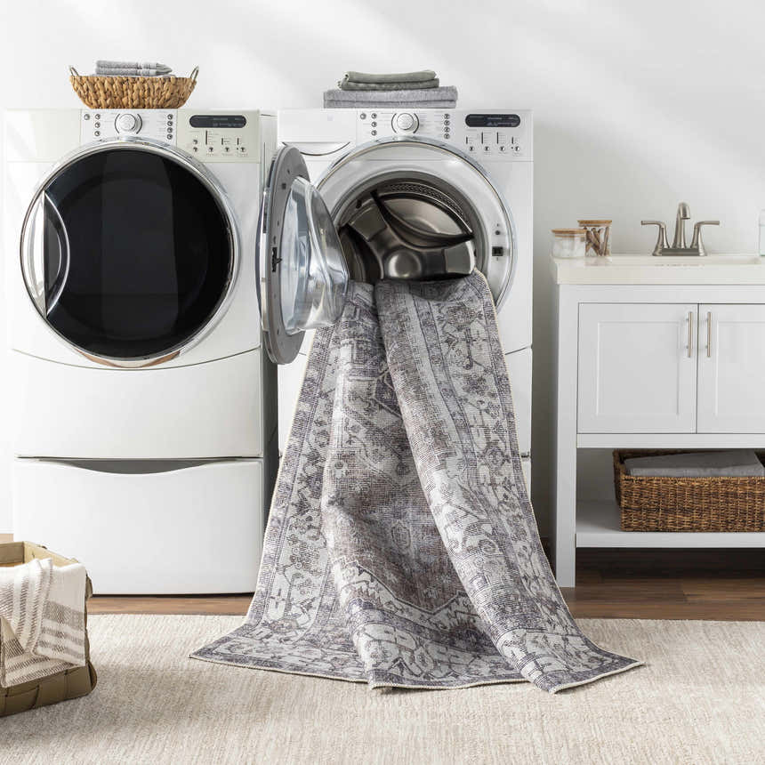 Athor Washable Rug being washed in a laundry room. Dark gray, brown traditional style. Washing-Machine