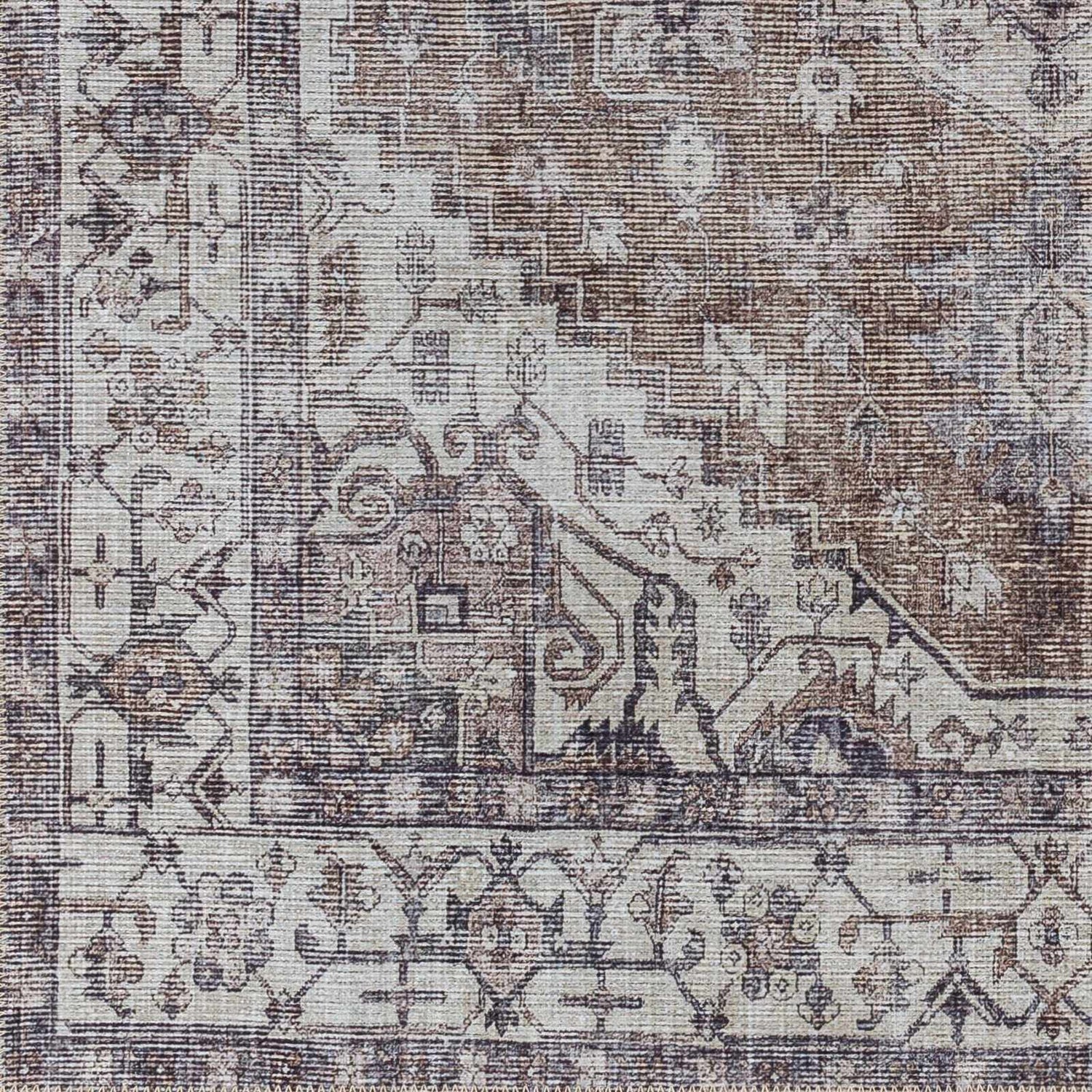 Close-up of the Athor Washable Rug. Traditional design in dark gray, eggplant, multi-brown, natural gray, and taupe hues. Swatch