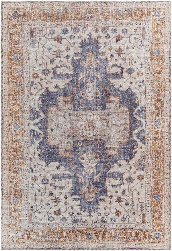 Close-up of the Egor Washable Area Rug. Features a traditional design in dark beige, ink, and nutmeg hues. Machine woven texture. Design-Rectangle-5373