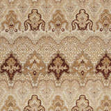 Close-up of the Saratoga Area Carpet showing its traditional, hand-knotted design in brick red, camel, and light brown wool. Swatch