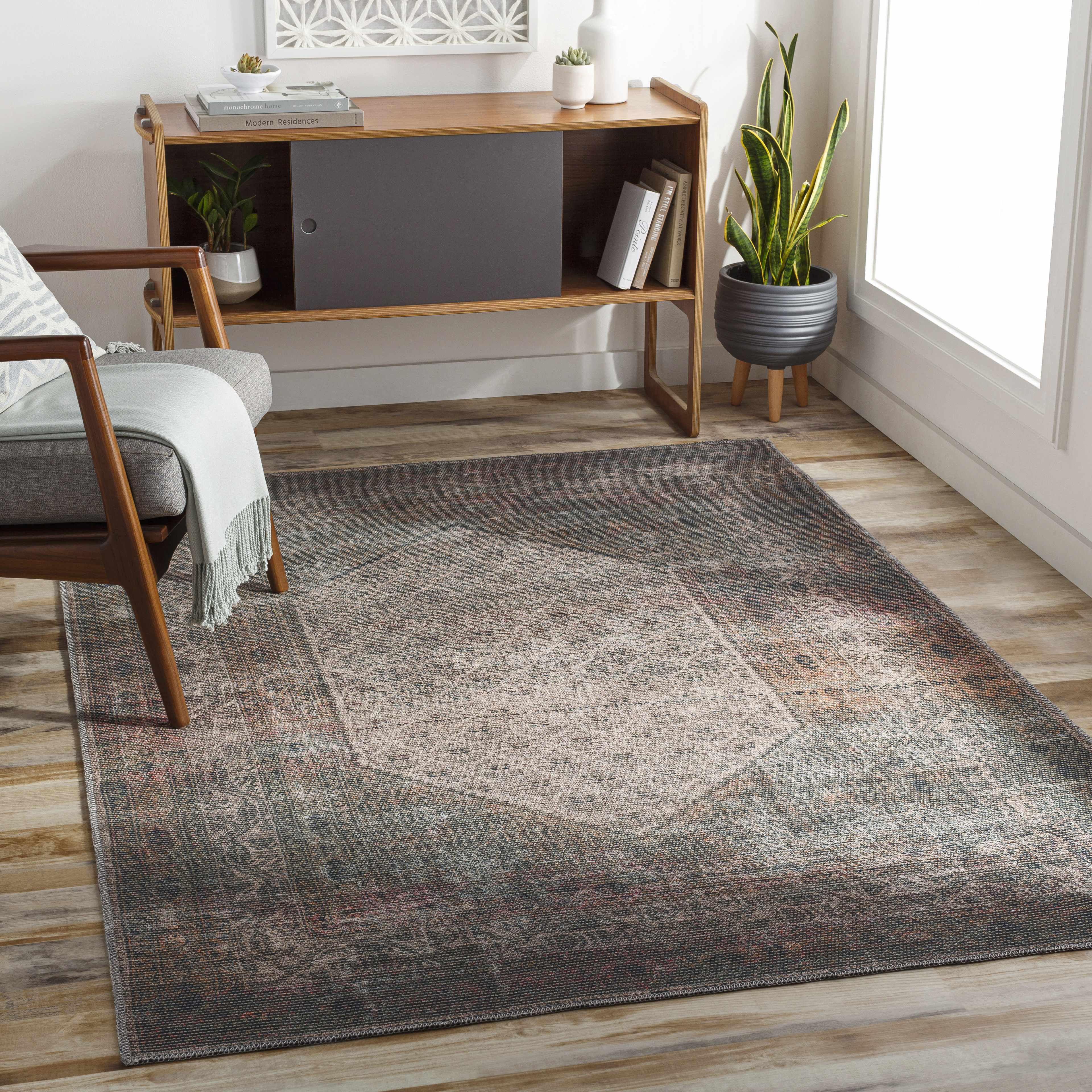 Olive Sariaya Distressed Washable Area Rug - Clearance placed in a styled room setting, harmonizing with surrounding room decor. Traditional Area Rug Backing Canvas 
