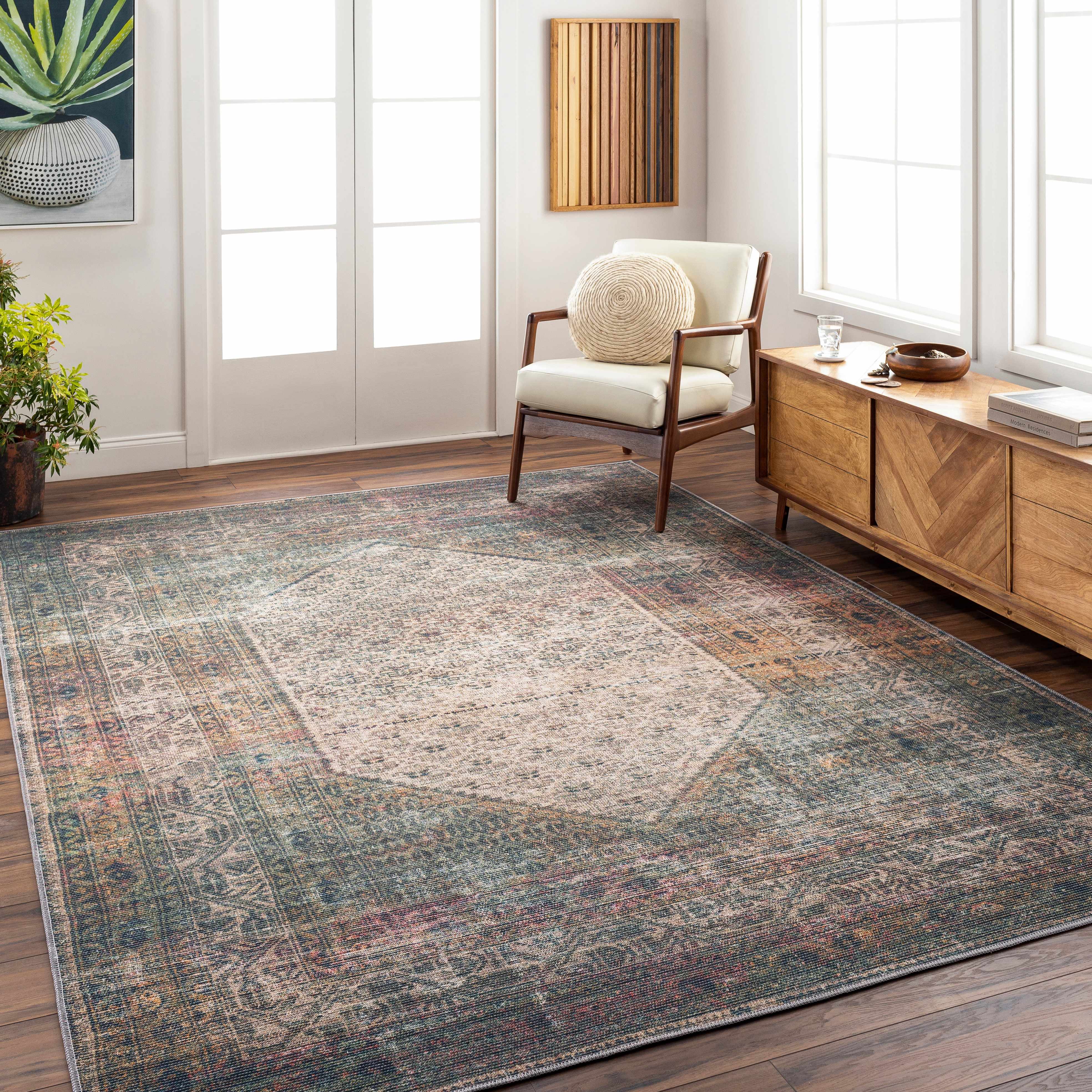 Olive Sariaya Distressed Washable Area Rug - Clearance placed in a styled room setting, harmonizing with surrounding room decor. Traditional Area Rug Backing Canvas 