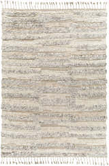 Close-up of the hand-knotted Saundersfoot Area Rug. Features charcoal, gray, and light beige wool with a textured, bohemian design. Design-Rectangle-69
