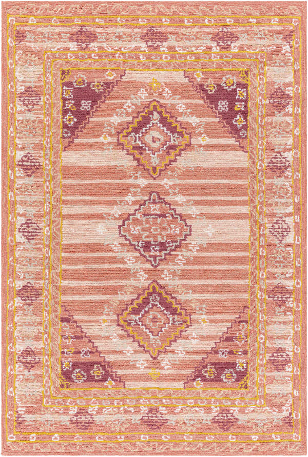 Close-up of Alena Peach Wool Blend Area Rug featuring traditional diamond pattern, stripes, and bronze, pink, and garnet colors. Design-Rectangle-576