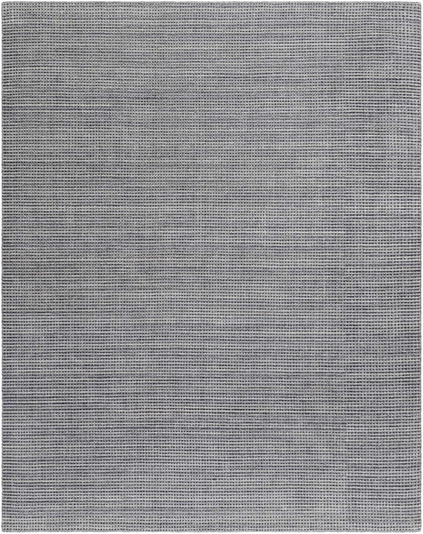 Close-up of the hand-knotted Laila Light Charcoal Area Rug showing its gray color and textured, contemporary design. Design-Rectangle-810