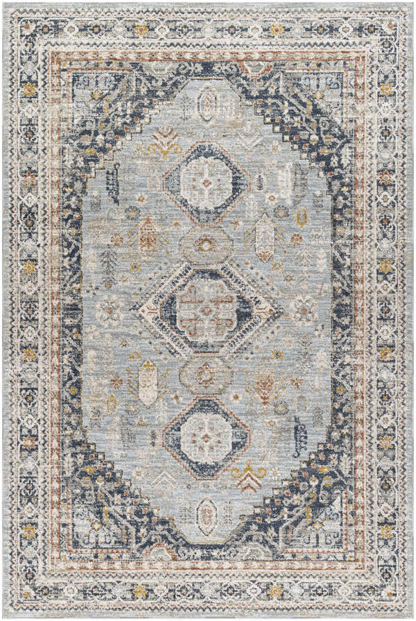 Detailed view of the Gilda Area Rug in light gray and natural gray with a traditional, geometric pattern. Design-Rectangle-6796