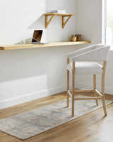 Home office with Marlene Medallion Beige & Blue Area Rug runner under a modern chair and floating desk. Roomscene-Runner