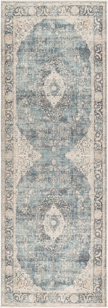 Close-up of the Marlene Medallion Blue Area Rug. Farmhouse style rug with a traditional medallion pattern in blue, cream, and charcoal. Design-Runner-2773