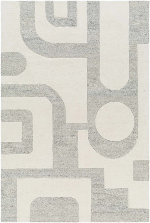 Close-up of the hand-tufted Adeja Area Rug. Gray geometric shapes on a light gray wool background. Contemporary style. Design-Rectangle-576