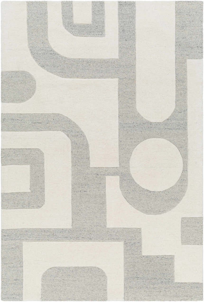 Close-up of the hand-tufted Adeja Area Rug. Gray geometric shapes on a light gray wool background. Contemporary style. Design-Rectangle-576