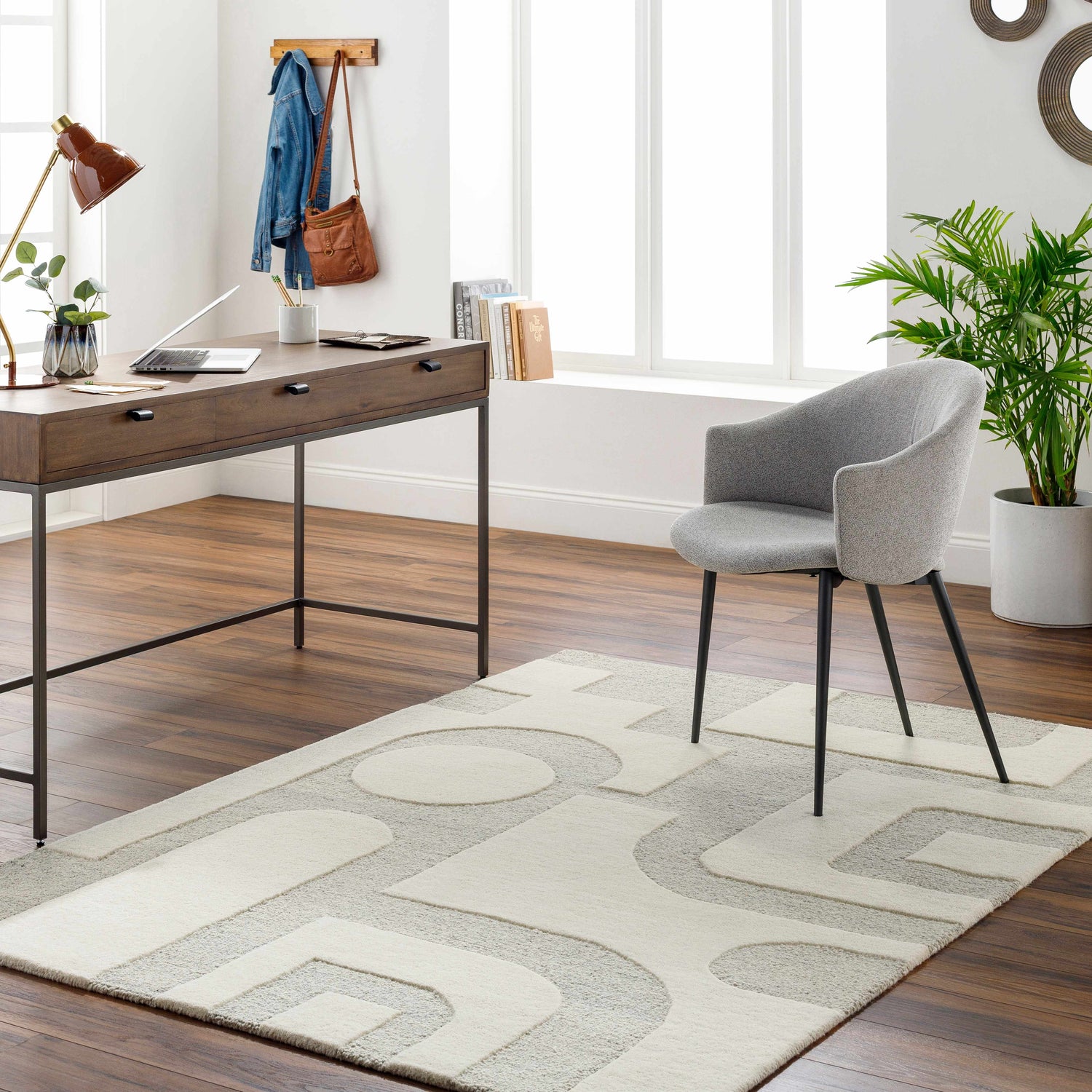 Home office with wood desk, gray chair, and light gray Adeja Area Rug featuring a contemporary geometric pattern. Roomscene-Rectangle