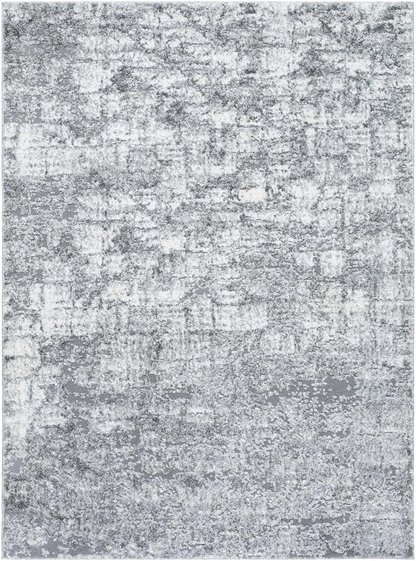 Close-up of the Suubi Area Rug, showcasing its light silver, silver gray, and slate blue abstract design. Design-Rectangle-5373