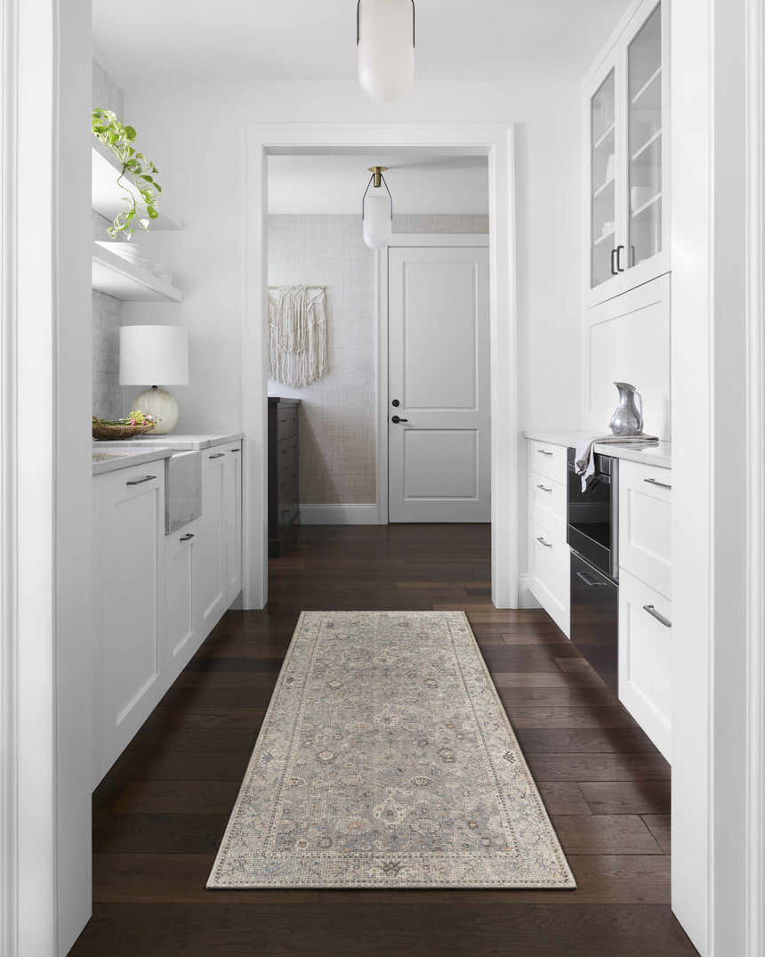 Farmhouse kitchen with white cabinets and Davina Damask Sage runner rug on dark wood floor. Livabliss x Becki Owens rug. Roomscene-Runner